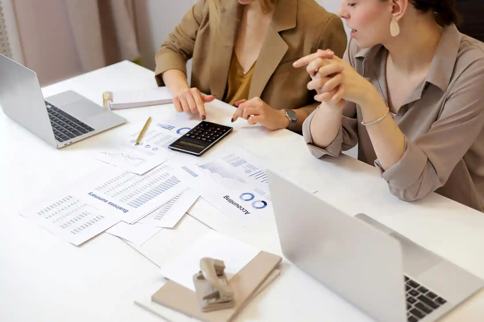 two-ladies-discussing-accounting
